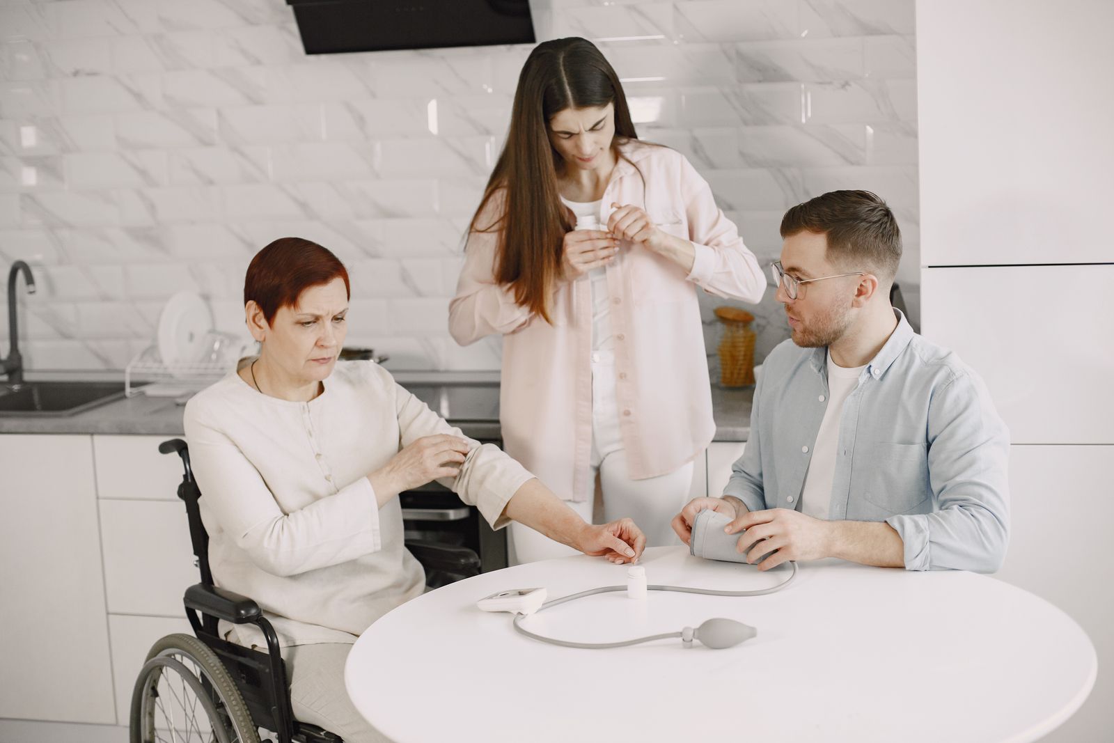 Family helping measure blood pressure at home